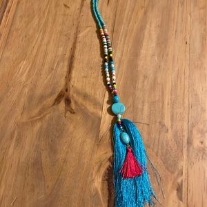 Turquoise beaded necklace with turquoise tassel